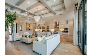 A cream sofa in a neutral coloured living room
