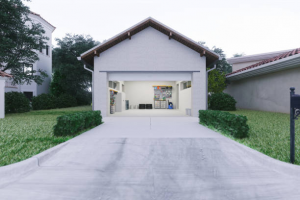 A detached white garage with a concrete drive 