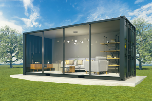 A sleek glass small building with a glass front wall