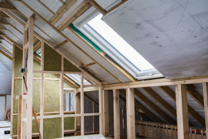 angled skylight window in unfinished attic
