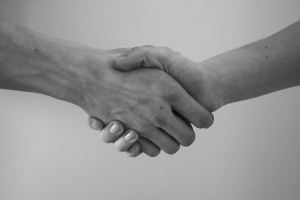 Greyscale image of a handshake