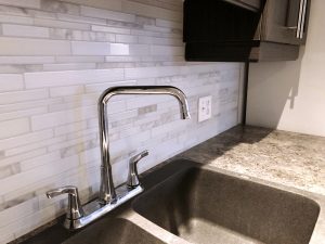 Light grey ceramic kitchen splashback