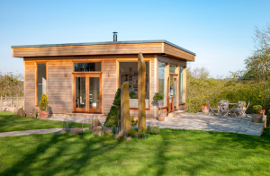 A small wooden construction set in a garden
