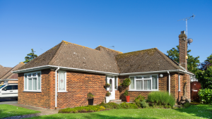 Red brick bungalow L shaped extension